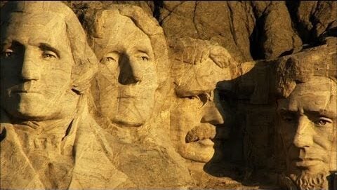 What Is Mount Rushmore Famous For? Discover Its Secrets! 61 mount rushmore at sunrise with soft golden light on the granite faces
