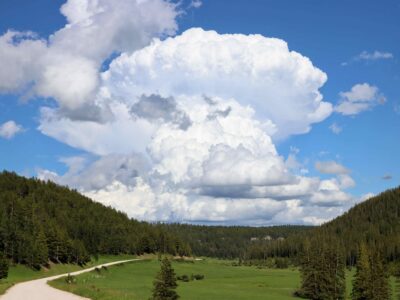 cumulonimbus cloud over the southern black hills rapidly growing on an otherwise beautiful day.