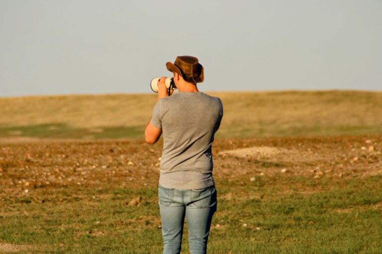 visitors slowing down while photographing the black hills and badlands