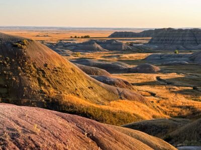 yellow mounds overlook in badlands national park at the golden hour photography tour